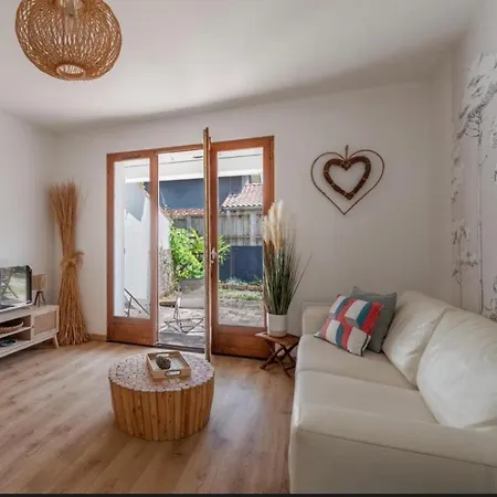 Сasa de vacaciones Maison Avec Jardin Village Du Cap Ferret